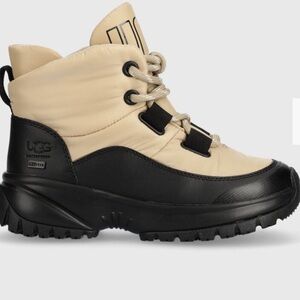 UGG Women's Yose Puffer Lace Boot, size 8, brand new never worn.